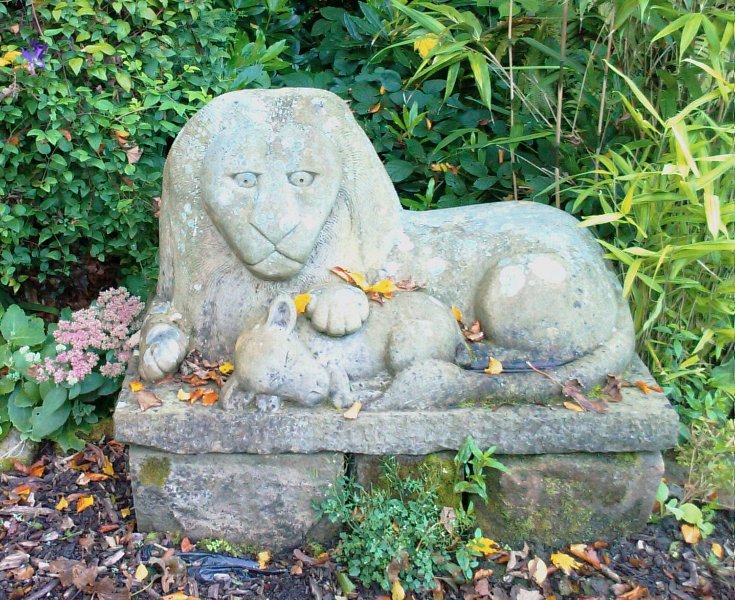 Lion and lamb sculpture